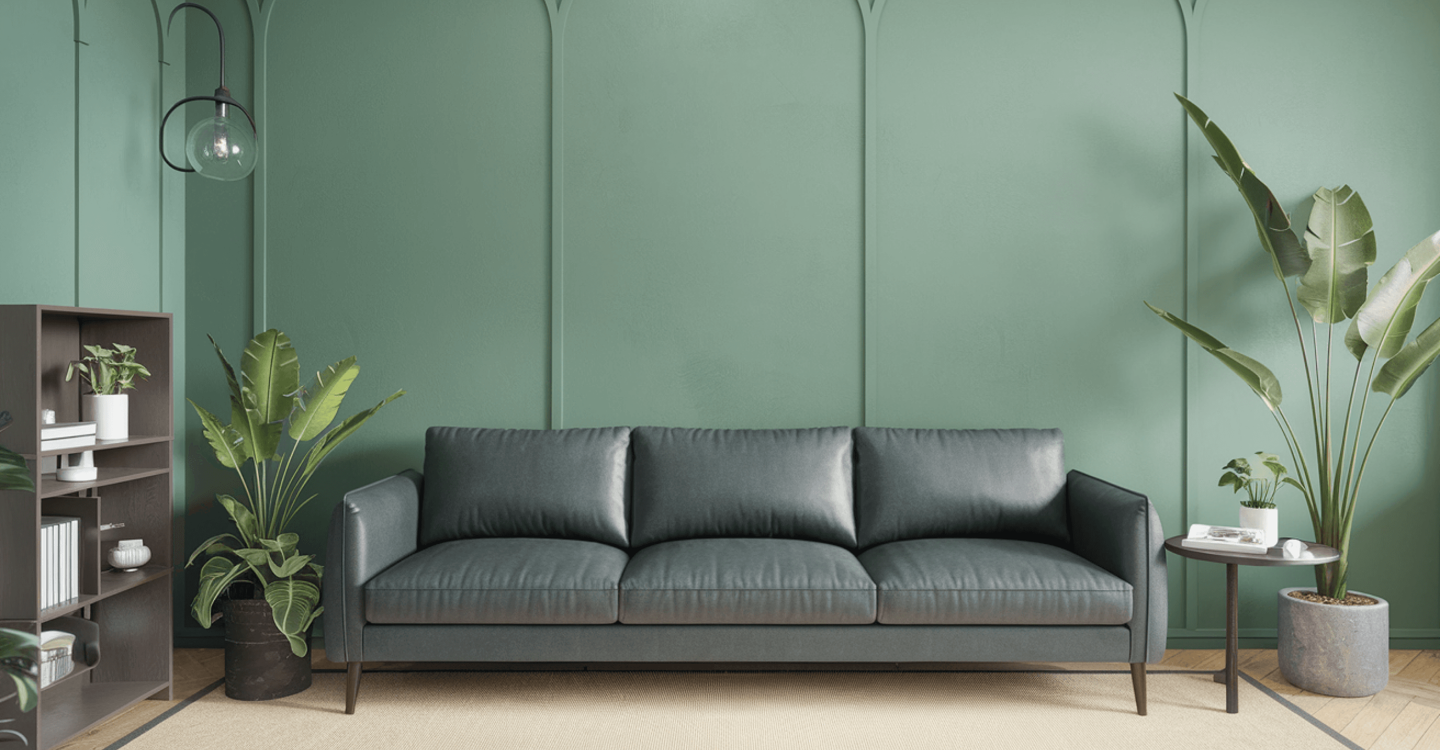 Living room with dark green three-seater sofa